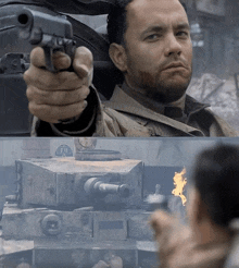 a man holding a gun in front of a tank that says ' e.i.f. ' on it