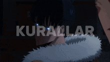 a close up of a person 's eye with the word kurawar on the bottom
