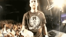 a man wearing a shirt that says gp on it