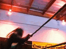 a wrestling ring with a sign that says card collectible