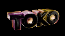 the letters t and k are displayed on a black surface