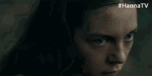 a blurry picture of a person 's face with the hashtag #hannatv on the bottom