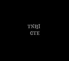 a black background with the words tnhi gte written in white letters