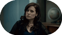 a woman with a serious look on her face is in an oval frame