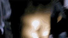 a close up of a person 's torso with a blurred background