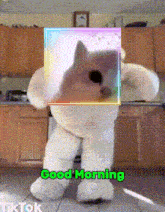 a teddy bear says good morning with a picture of a dog on it