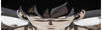 a close up of a person 's face with a serious look on their face