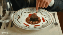 a plate of food with the word yeburg on the bottom left