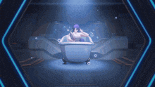 a person is standing in a room with a blue light on the wall