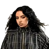 a woman with curly hair is wearing a black and white striped shirt