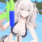 a girl in a bikini is holding a water gun with a green handle