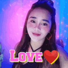 a woman with a red heart and the word love behind her