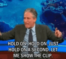 Jon Stewart Hold On GIF - Jon Stewart Hold On Show Me The Clip GIFs