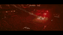 a group of people are playing instruments on a stage