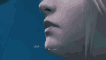 a close up of a person 's ear with a blue earring and the word cloud on it .