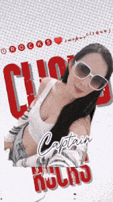 a woman wearing sunglasses and a white tank top with the name captain rocks on the bottom