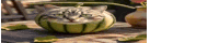 a cat is sitting inside of a watermelon .