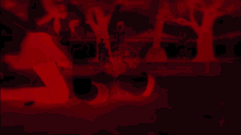 a red and black image of a man and a woman