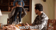 Hold This Baby Sit GIF - Hold This Baby Sit Your Turn GIFs