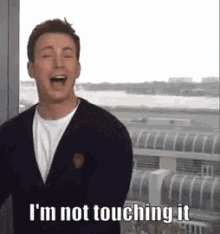 Chris Evans Not Going There GIF - Chris Evans Not Going There Touch It GIFs