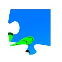 a blue piece of puzzle with a green object in it