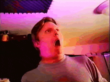 a man with his mouth open looks surprised in a video