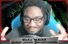 a man wearing glasses and headphones with the name shaka warlock on it