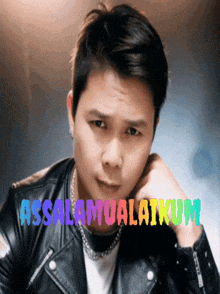 a man wearing a leather jacket with the words assalamualaikum written on the bottom
