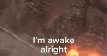 a picture of a monster with the words i 'm awake alright written on it