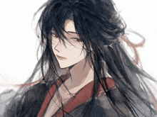 a drawing of a person with long black hair and red eyes