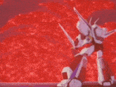 a robot is standing in front of a red background holding a sword .