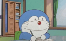 doraemon is writing on a piece of paper with a pen .