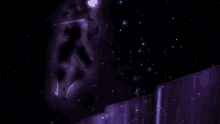 a person is flying through the air in a purple light