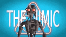 a robot with red eyes is standing in front of a neon sign that says the atomic