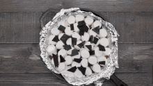 a skillet filled with marshmallows and chocolate chunks
