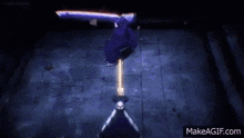 a person is standing in a dark room with a sword in their hand and a purple light coming out of it .