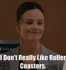 a woman in a lab coat with the words " i don t really like roller coasters "