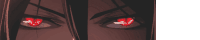 a close up of a person 's eyes with red glowing eyes .