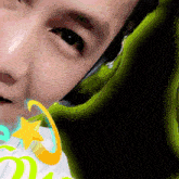 a close up of a person 's face with a yellow star in the corner