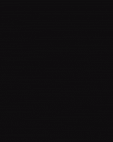 a person is standing in front of a purple background with a light coming out of it .