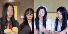 a group of young girls are standing next to each other and one has glasses on