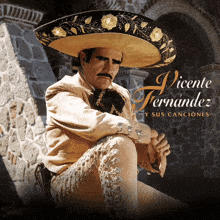 a poster for vicente fernandez y sus canciones features a man in a sombrero