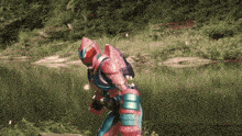 a pink and purple superhero is standing next to a river