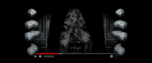 a video of a scary face with blood on it