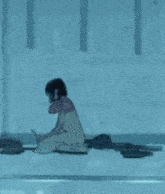 a cartoon of a woman kneeling down next to a man in a bathtub .