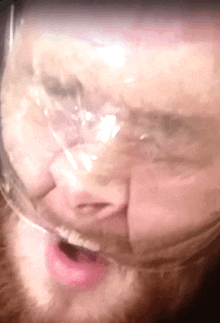 a close up of a person 's face with a clear plastic mask on