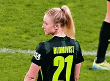 a female soccer player with the name blomqvist on her back