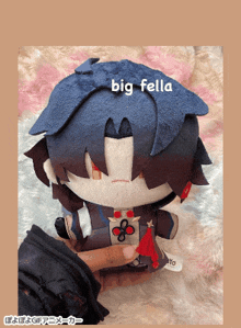 a picture of a stuffed animal that says big fella on it