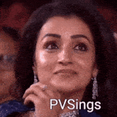 a close up of a woman 's face with the words pv sings written on the bottom .