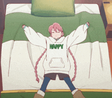 a girl is laying on a bed wearing a happy hoodie